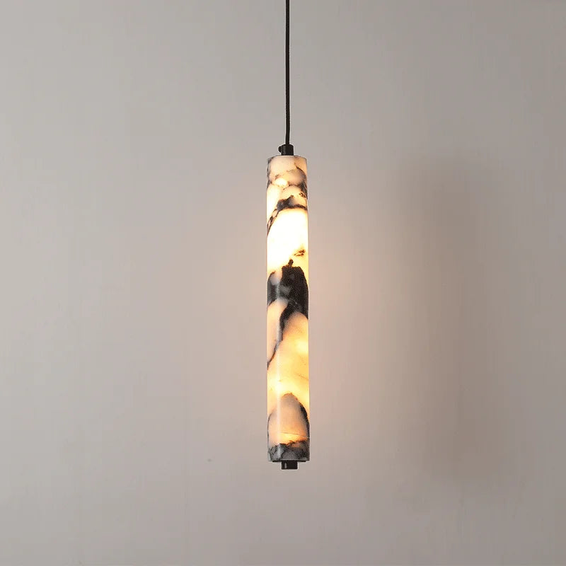 Fût, suspension cylindre en marbre noir, vue d'ensemble